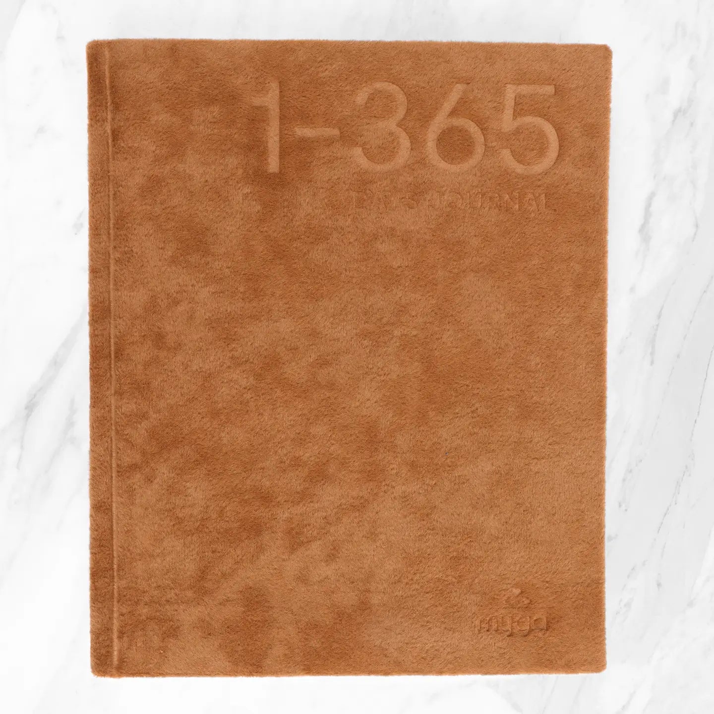 365 Days Journal with brown cover placed on marble background.