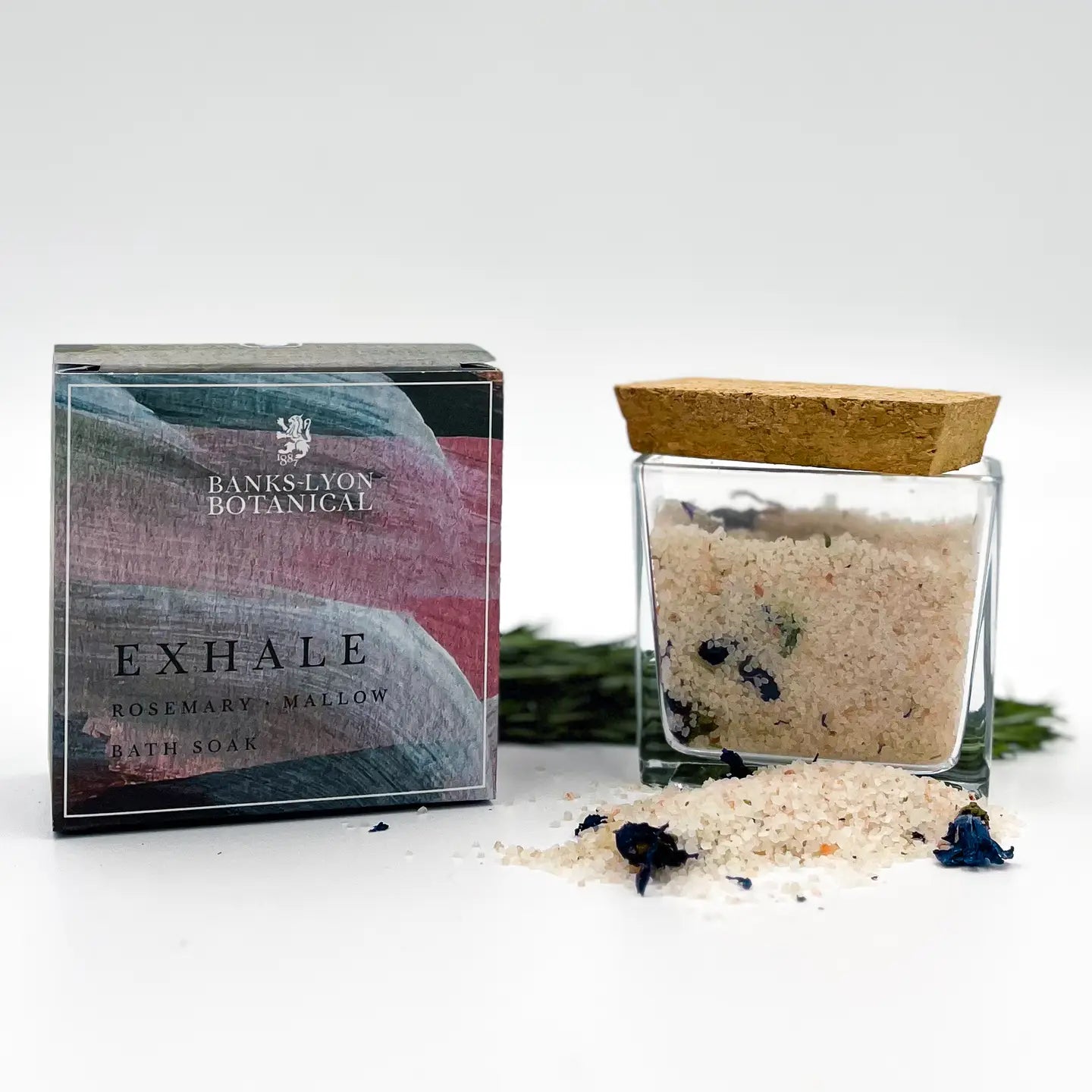 Exhale Bath Soak in glass jar with natural clays, botanicals, and essential oils for relaxation.