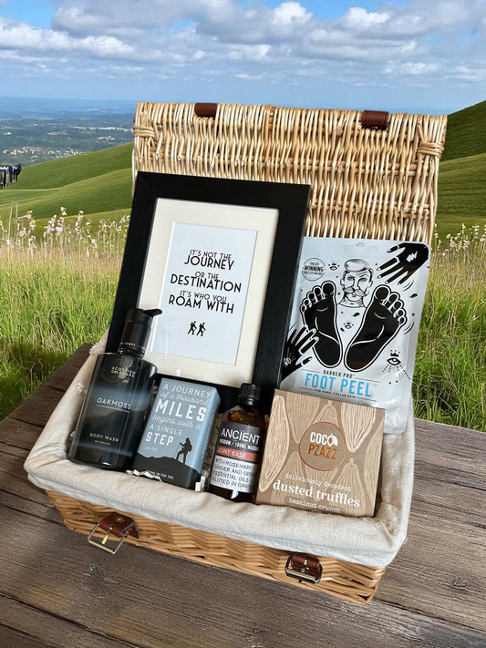 Walker’s Gift set with framed quote, therapeutic foot peel, joint ease oil, walking-themed body wash, hand soap, and premium dusted truffles.