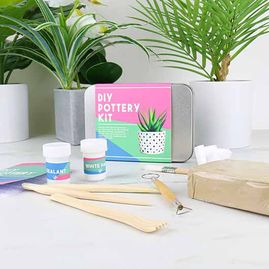 Artistic Pottery Decorating Kit with tools and materials for beginners.