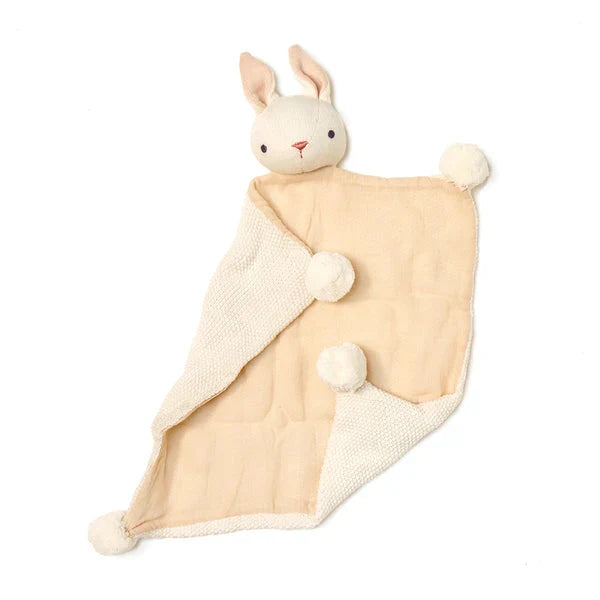 Soft cream bunny comforter with pom poms and linen panel for newborns.