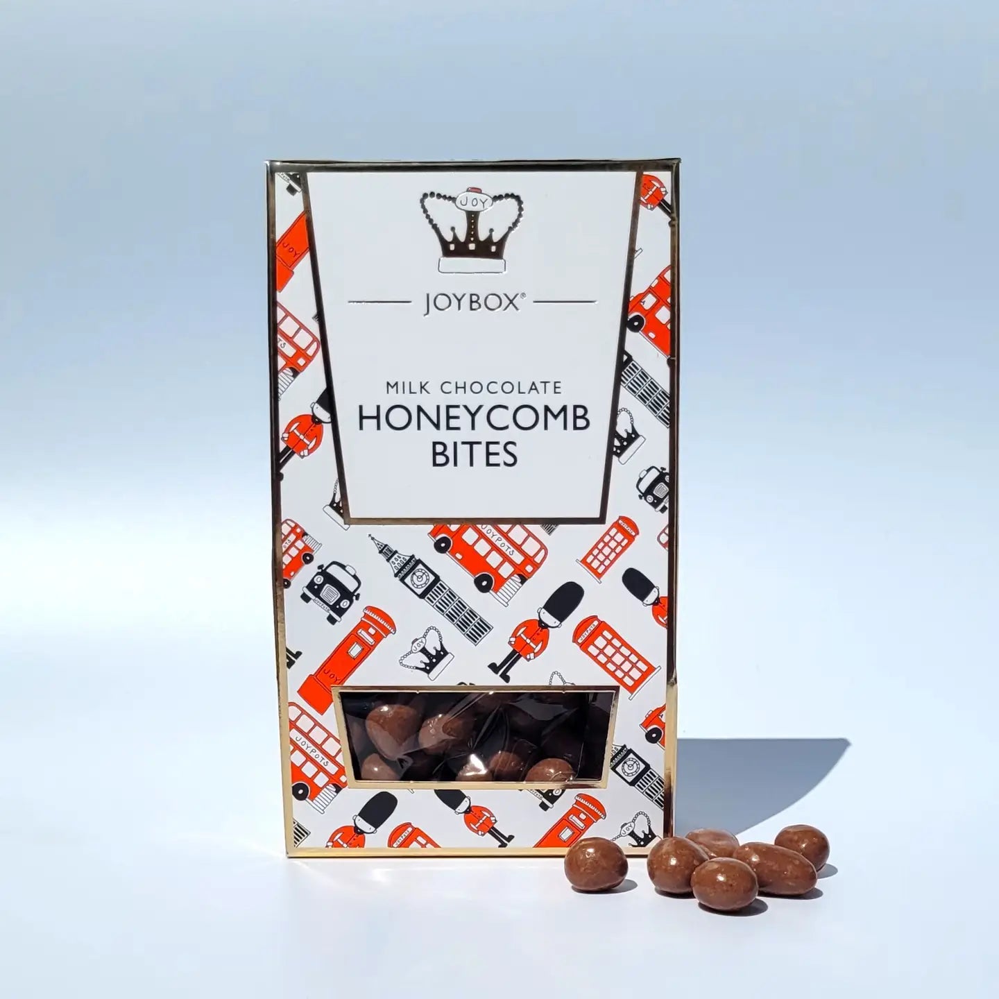 Chocolate Honeycomb Bites in colorful packaging with a view of chocolate-coated pieces.