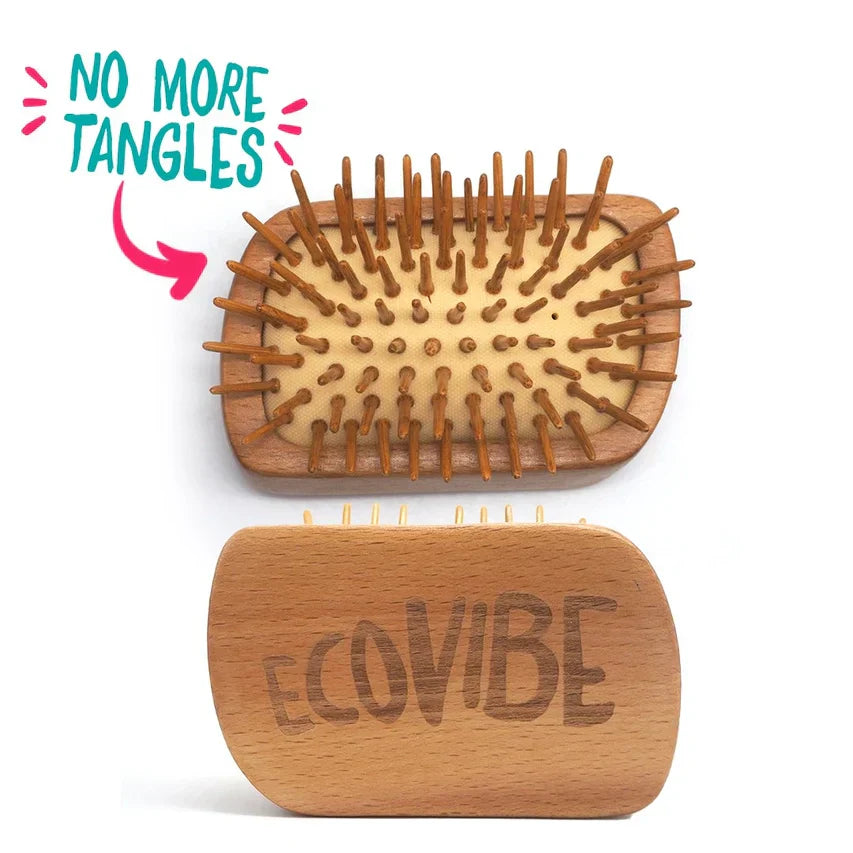 Eco-friendly bamboo detangling hairbrush with bamboo bristles and rubber cushion, sustainable and durable.