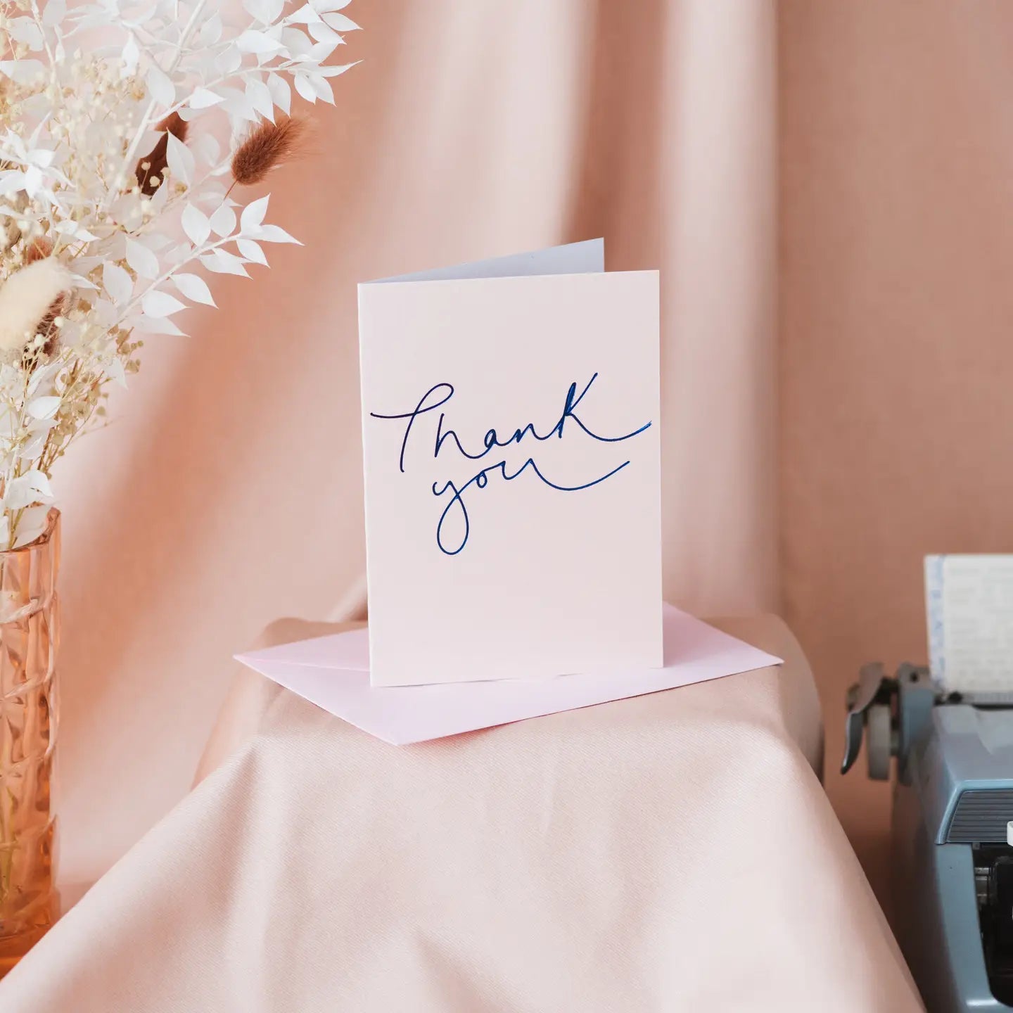 Thank You card with metallic rose and navy foil design.