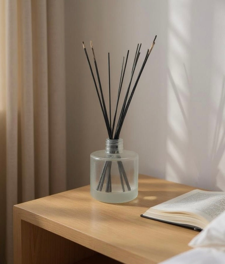 Elegant frosted glass bottle for diffuser oil refills.