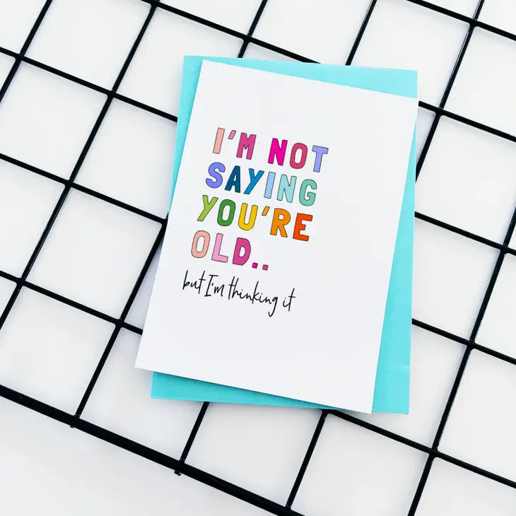 I'm Not Saying You're Old birthday card with colorful text on recycled white board.