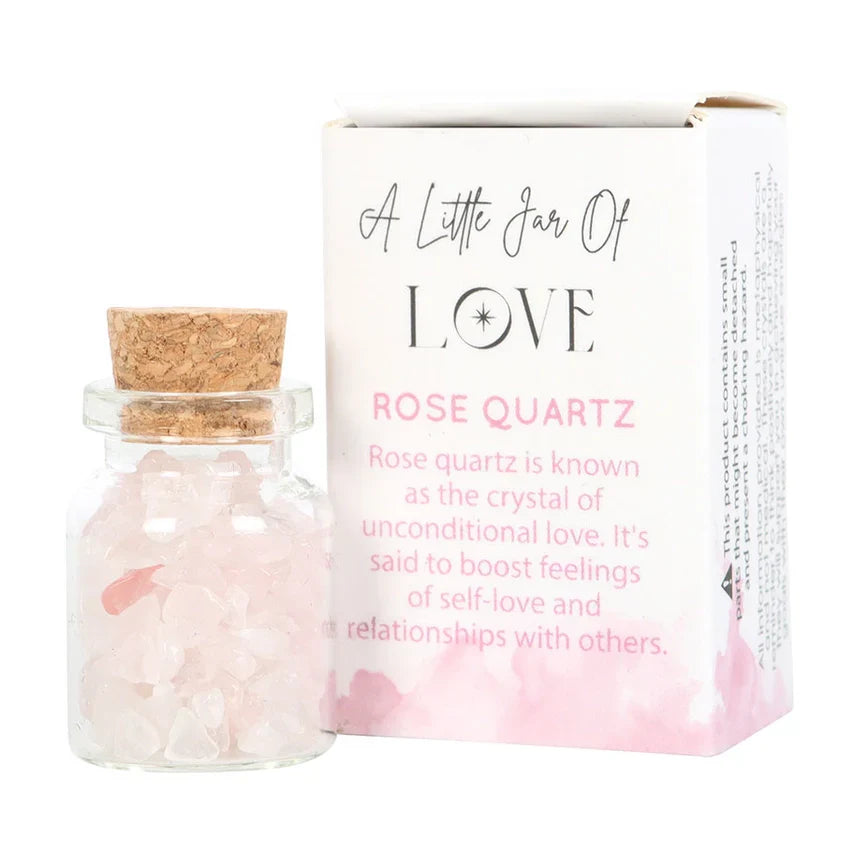 Jar of Love with rose quartz crystal chips in a matchbox, promoting unconditional love and healthy relationships.