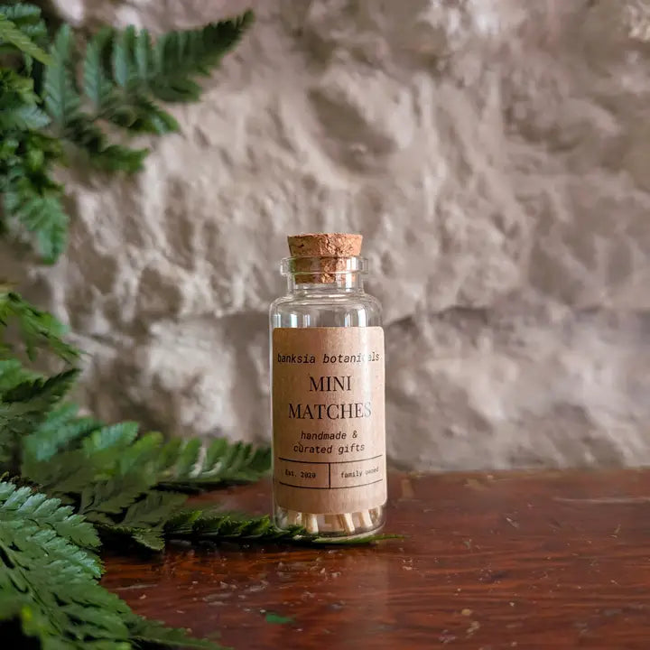 Luxury mini matches in cork-topped glass vessel for candles and incense.