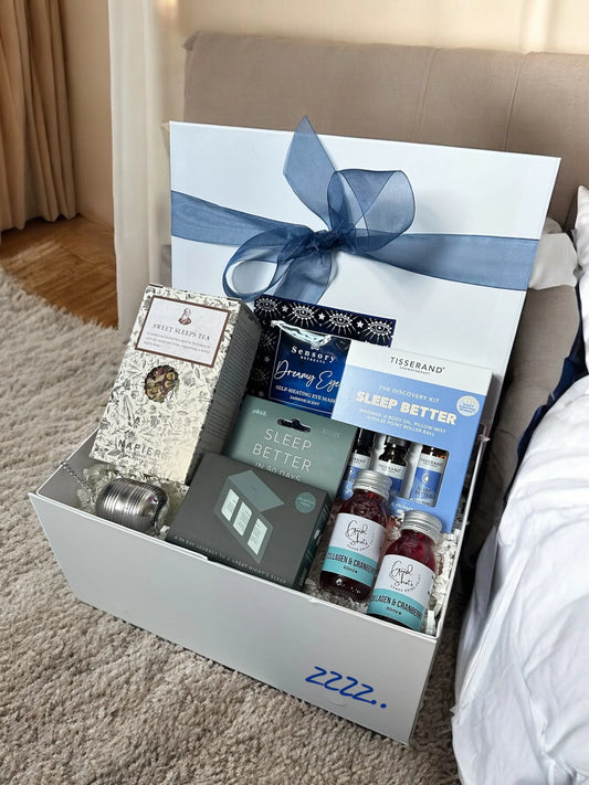 Sleep Better Gift Box with relaxation kit, guide, tea, and health shots for rejuvenating sleep.