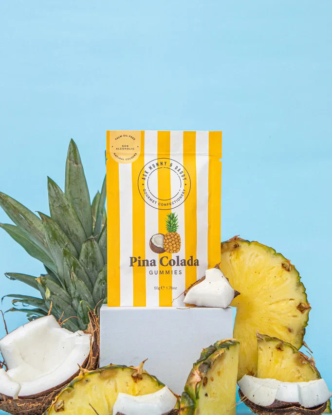 Pina Colada Gummies 50g pouch with pineapple and coconut accents.