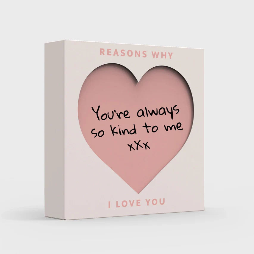 Personalized Reasons Why I Love You cards in a heart-shaped slide box.