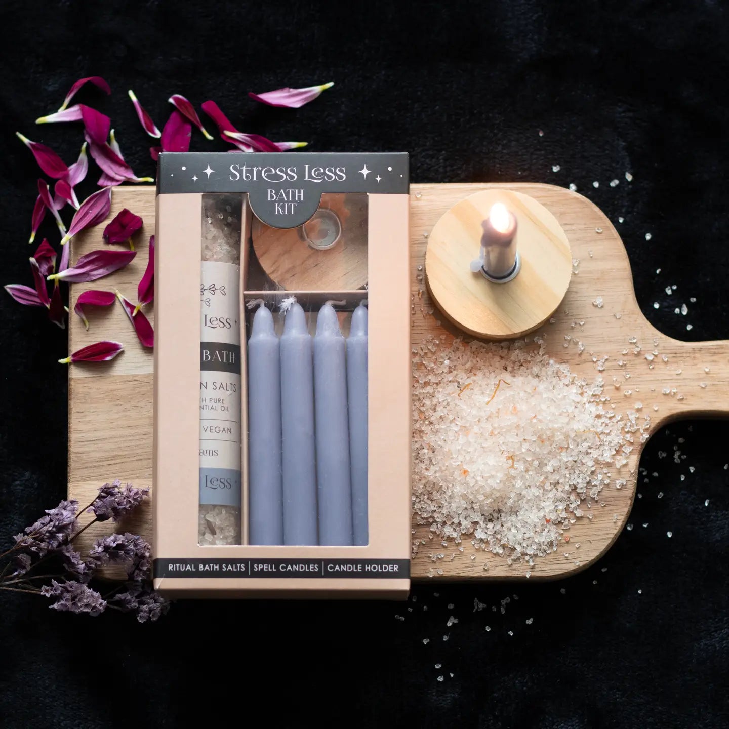 Stress Less Herbal Ritual Bath Salt Kit with purple spell candles and Himalayan bath salts.