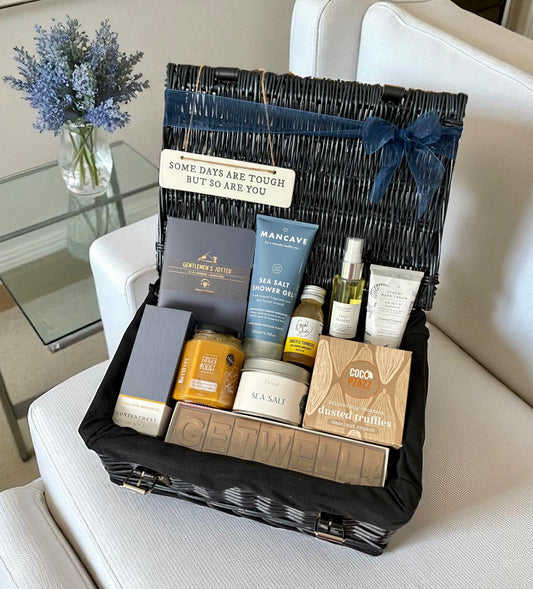 Gentlemen’s Get Well Soon Hamper with skincare, truffles, candle, tonic, notebook, and treats – luxury recovery gift for him.