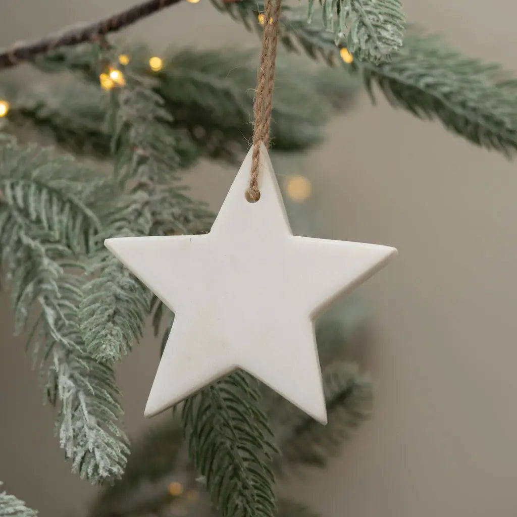 White marble star decoration, handcrafted for subtle elegance and a stylish home accent.