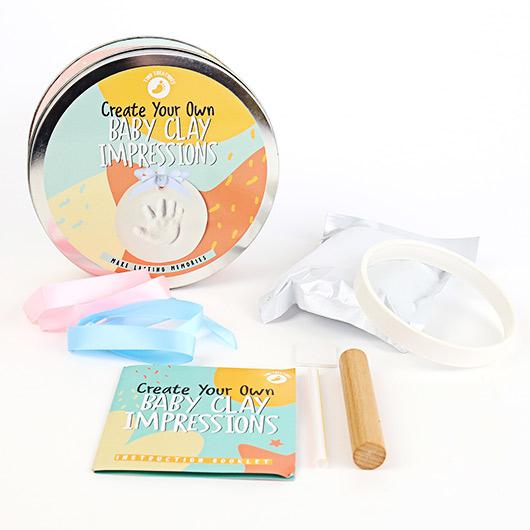 Baby Clay Impressions Kit for capturing baby hand and footprints.