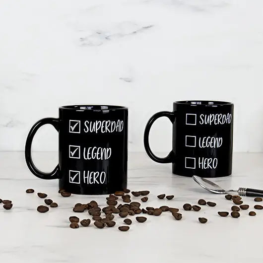 Super Dad heat reveal mug with coffee beans, featuring checkboxes for "Superdad," "Legend," and "Hero."