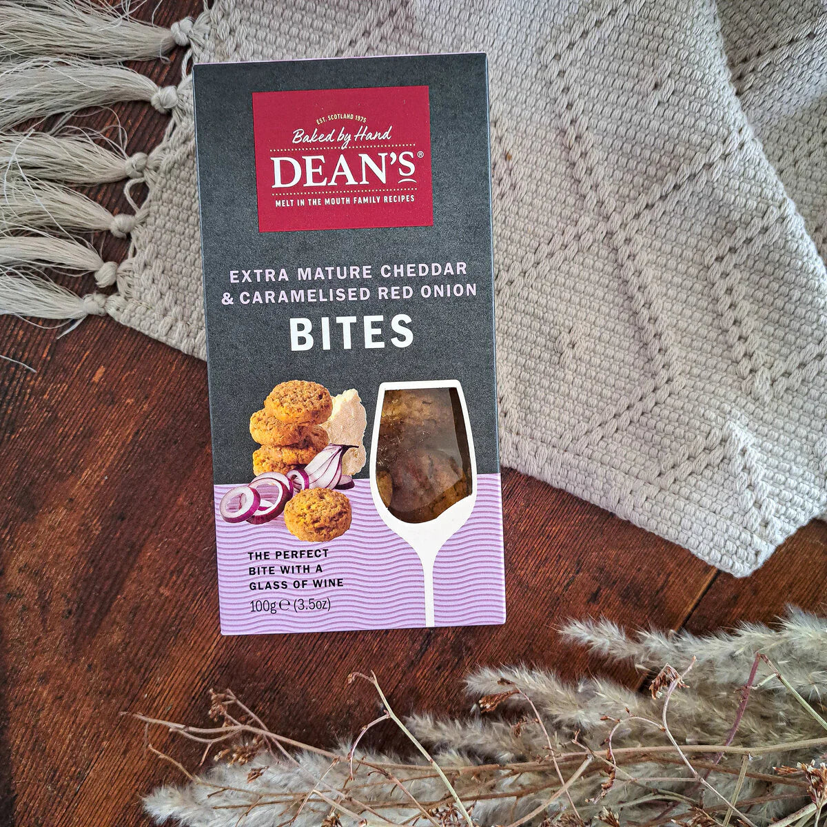 Extra Mature Cheddar & Caramelised Onion Bites package with hand-baked oaty snacks.