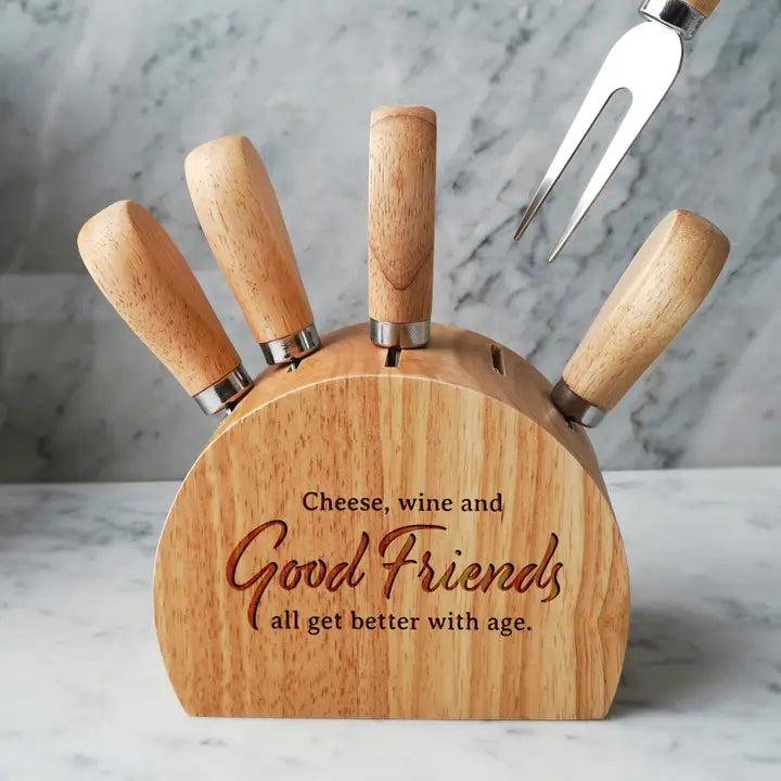 Wooden cheese knife block with knives.