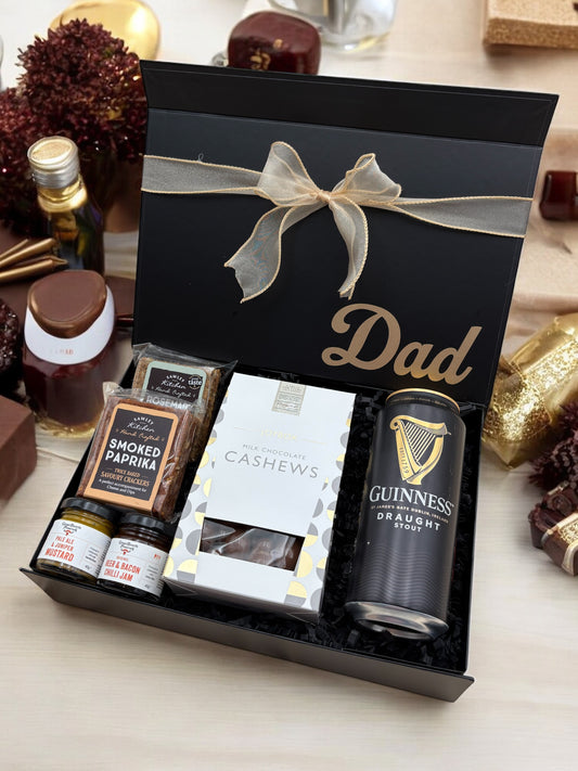 Dad gift box with craft beer, crackers, chutneys, and chocolate cashews.