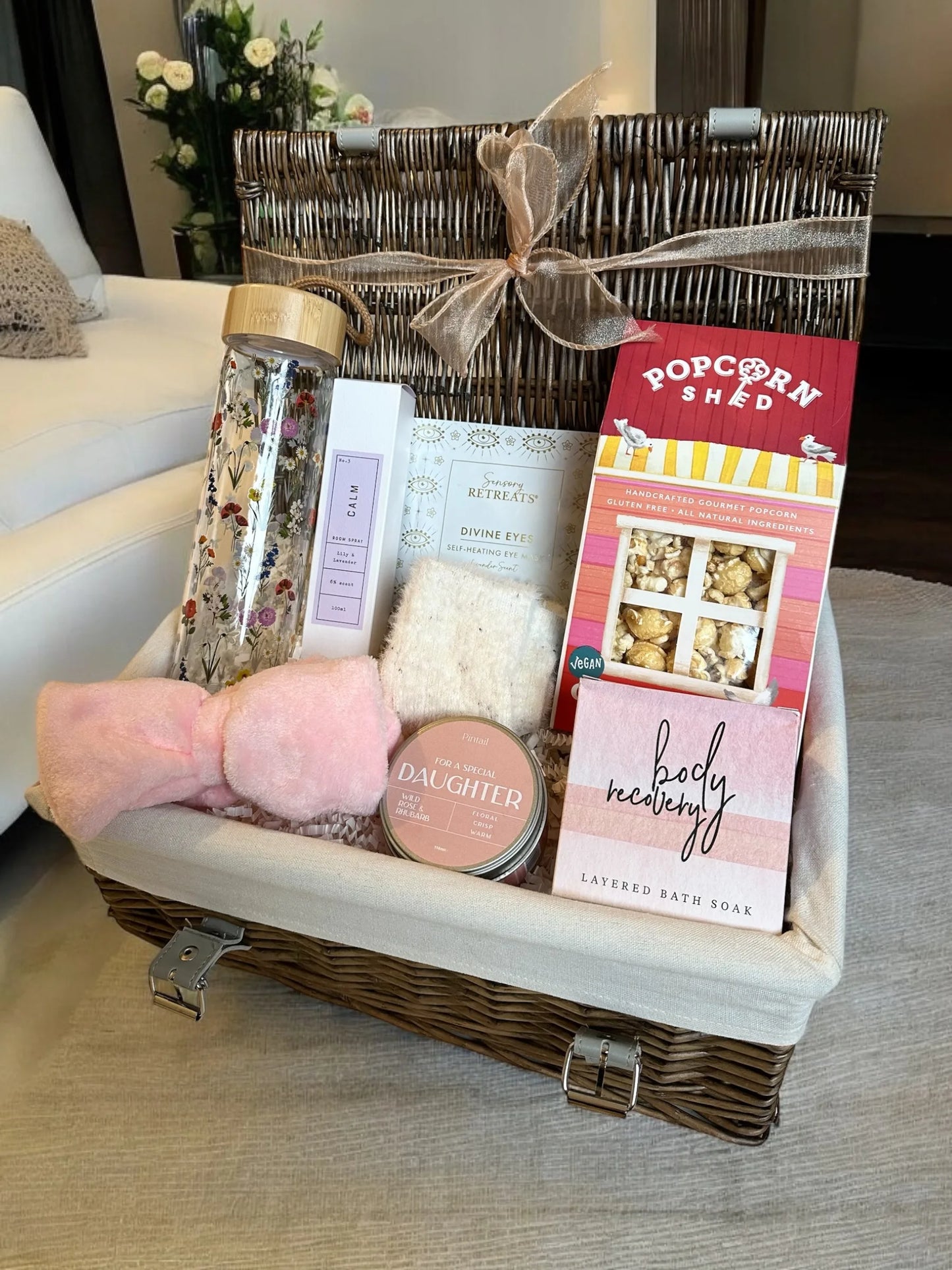 Gift hamper for a special daughter with snacks, bath essentials, and more.