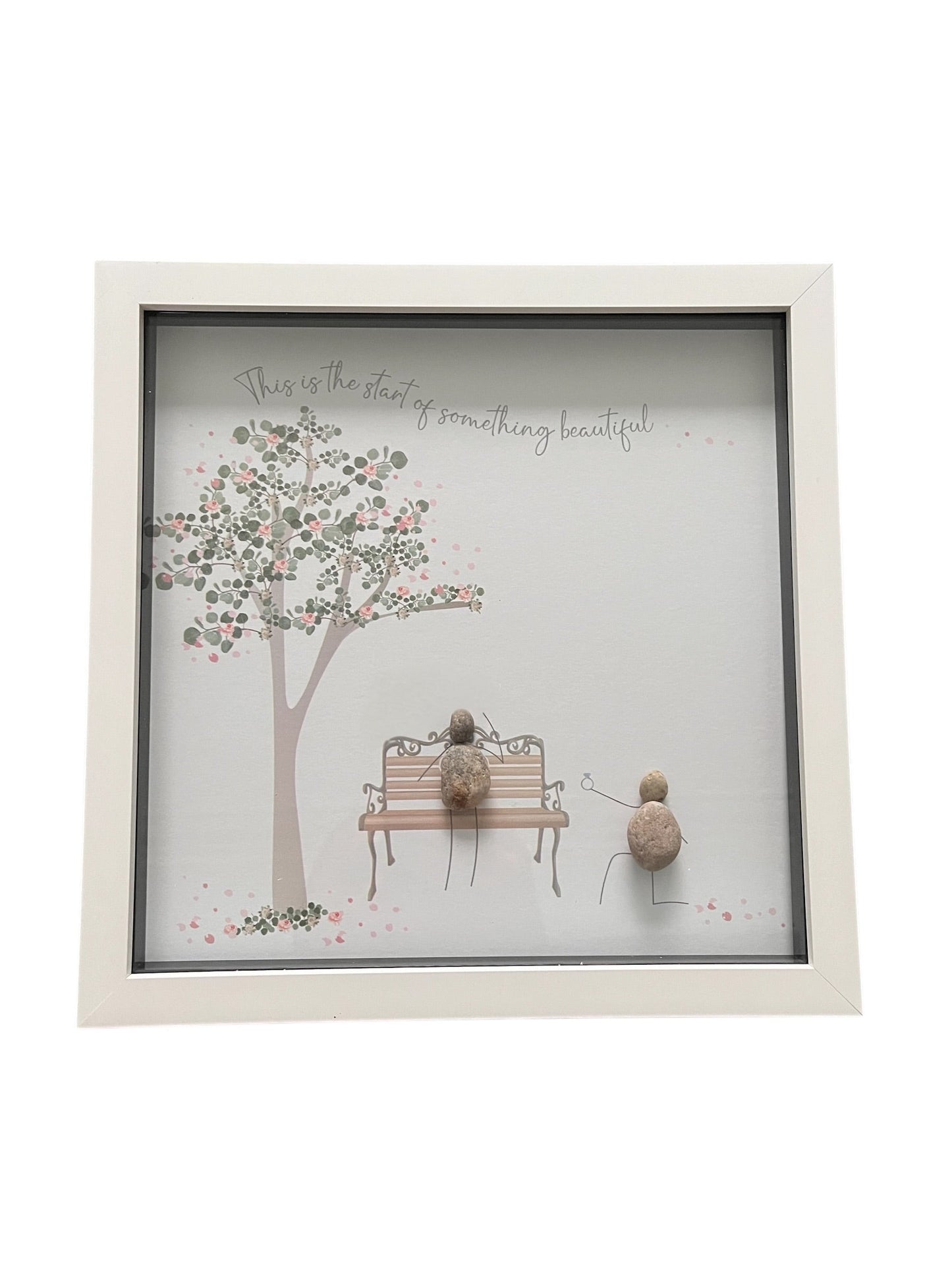 Engagement pebble artwork in deep edge frame with tree and bench design.