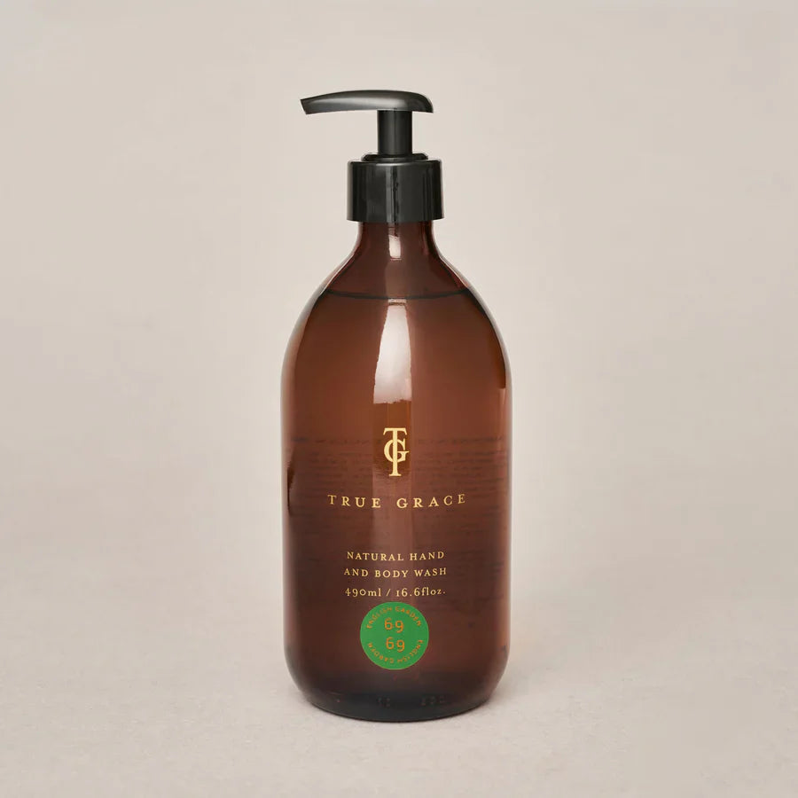 True Grace English Garden hand and body wash in amber glass bottle.