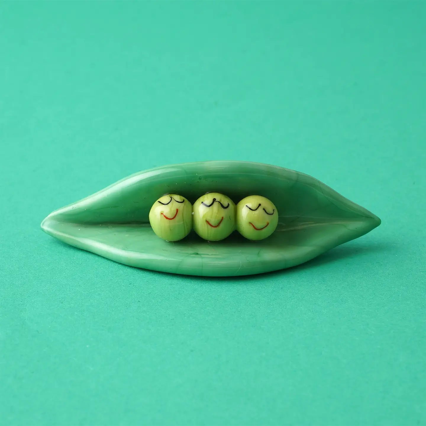 Three glass peas in a pod ornament