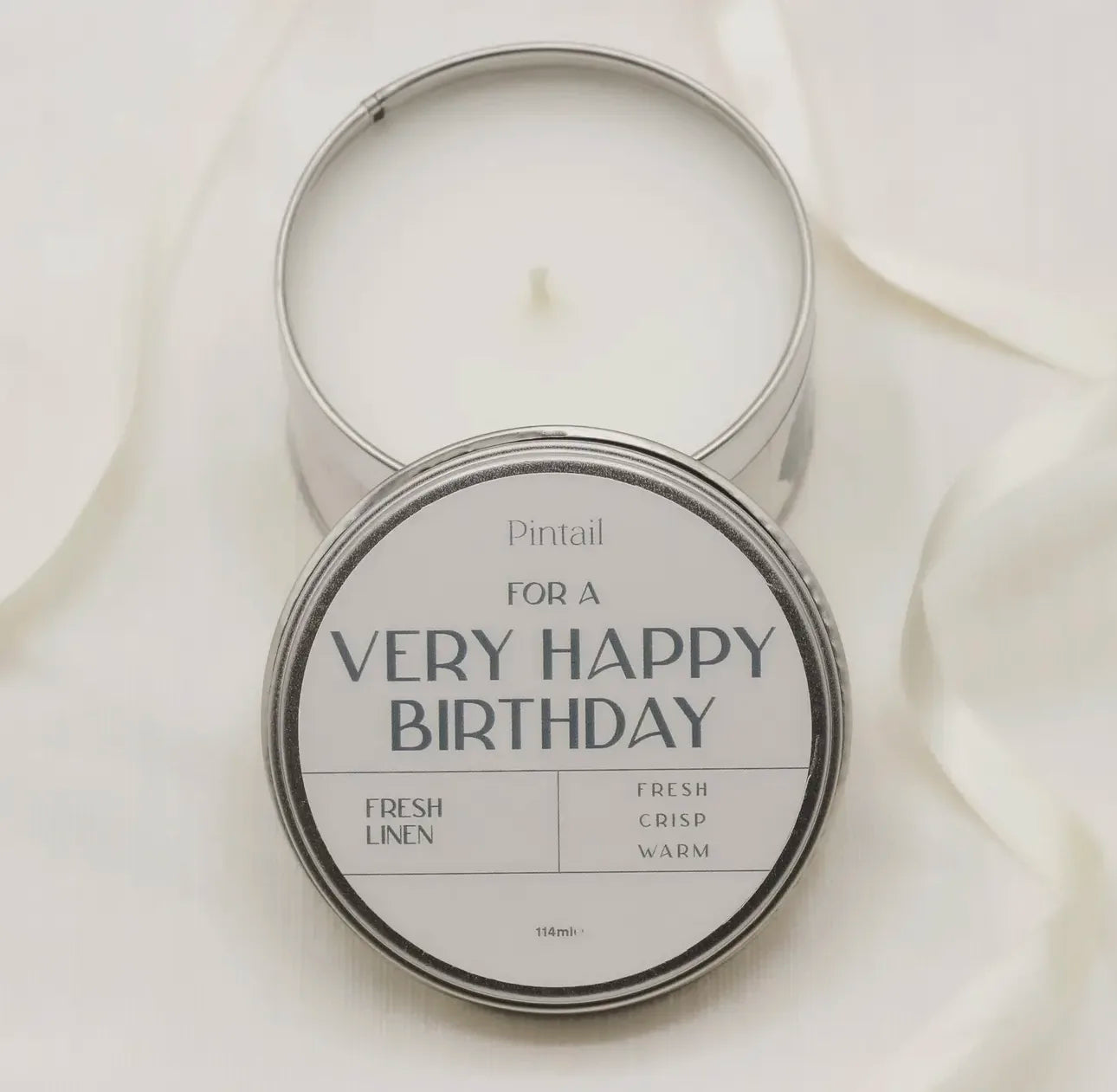 Fresh linen candle labeled "For a Very Happy Birthday" in a tin, 160g.
