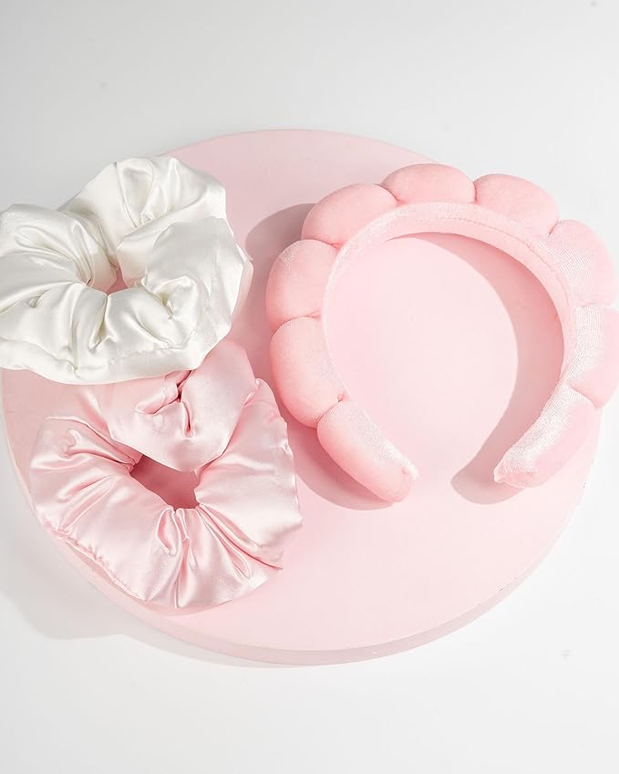 Packaging of 'Head in the Clouds' set by brush works with pink headband and scrunchies.
