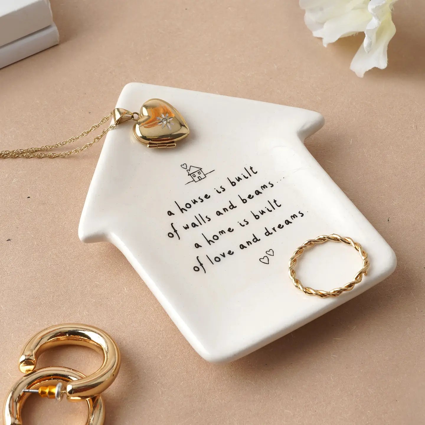 House-shaped ring dish for storing jewelry, perfect housewarming gift.