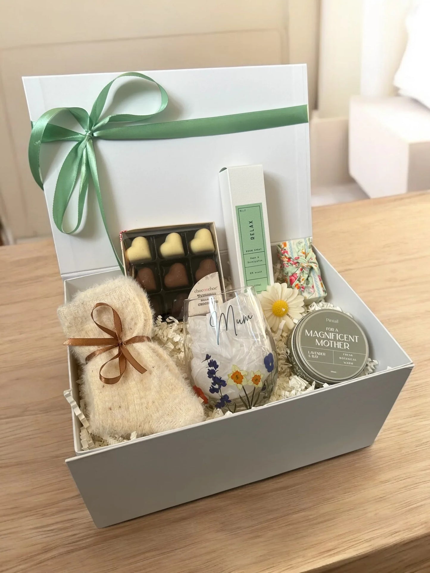 Mum’s Serenity Gift Box with room scent, socks, glass, candle, chocolates, soap, and lavender bay candle.