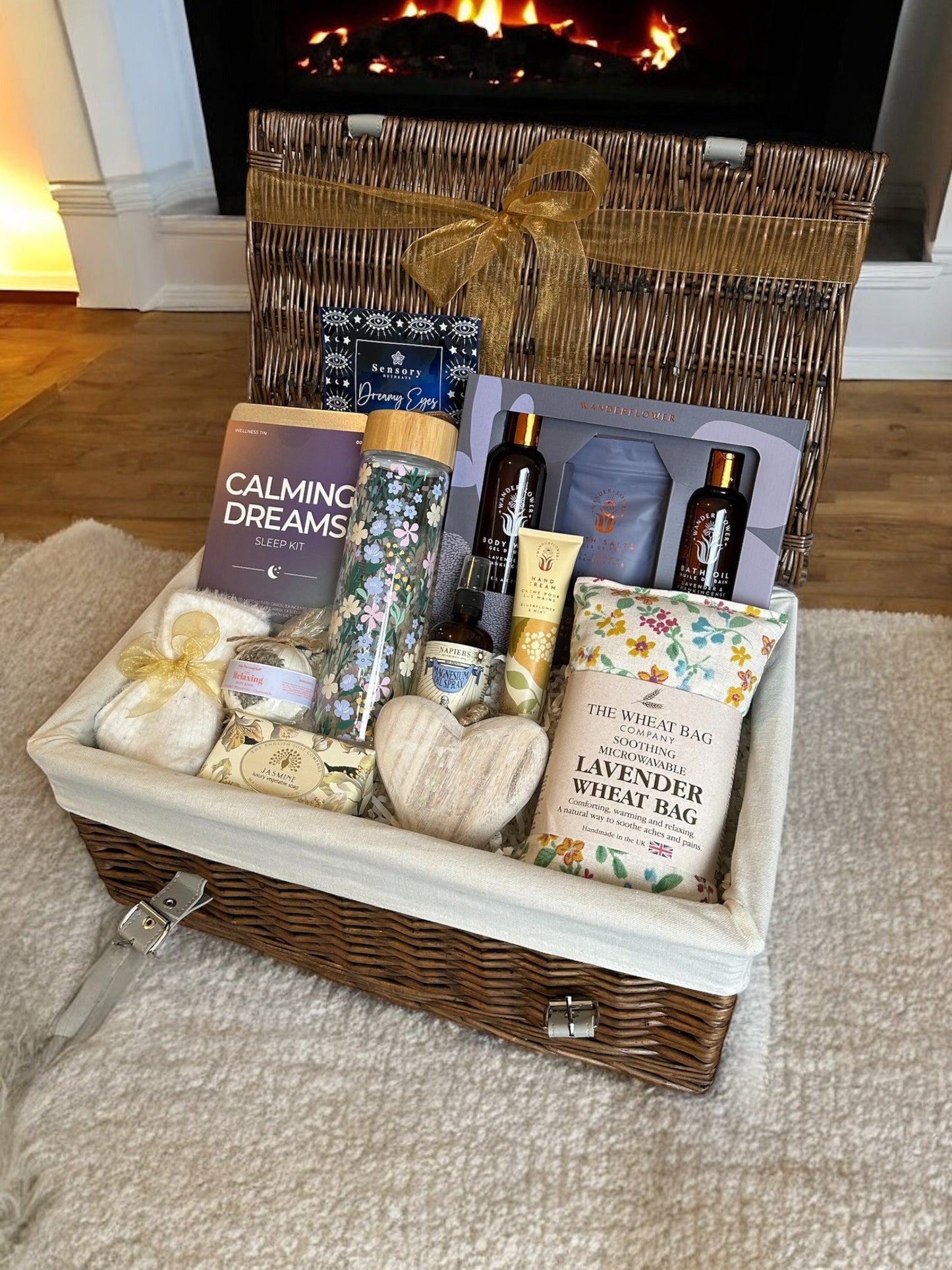 Ultimate Relax and Restore Hamper with relaxation products, including a sleep kit, bathing set, eye mask, and more.