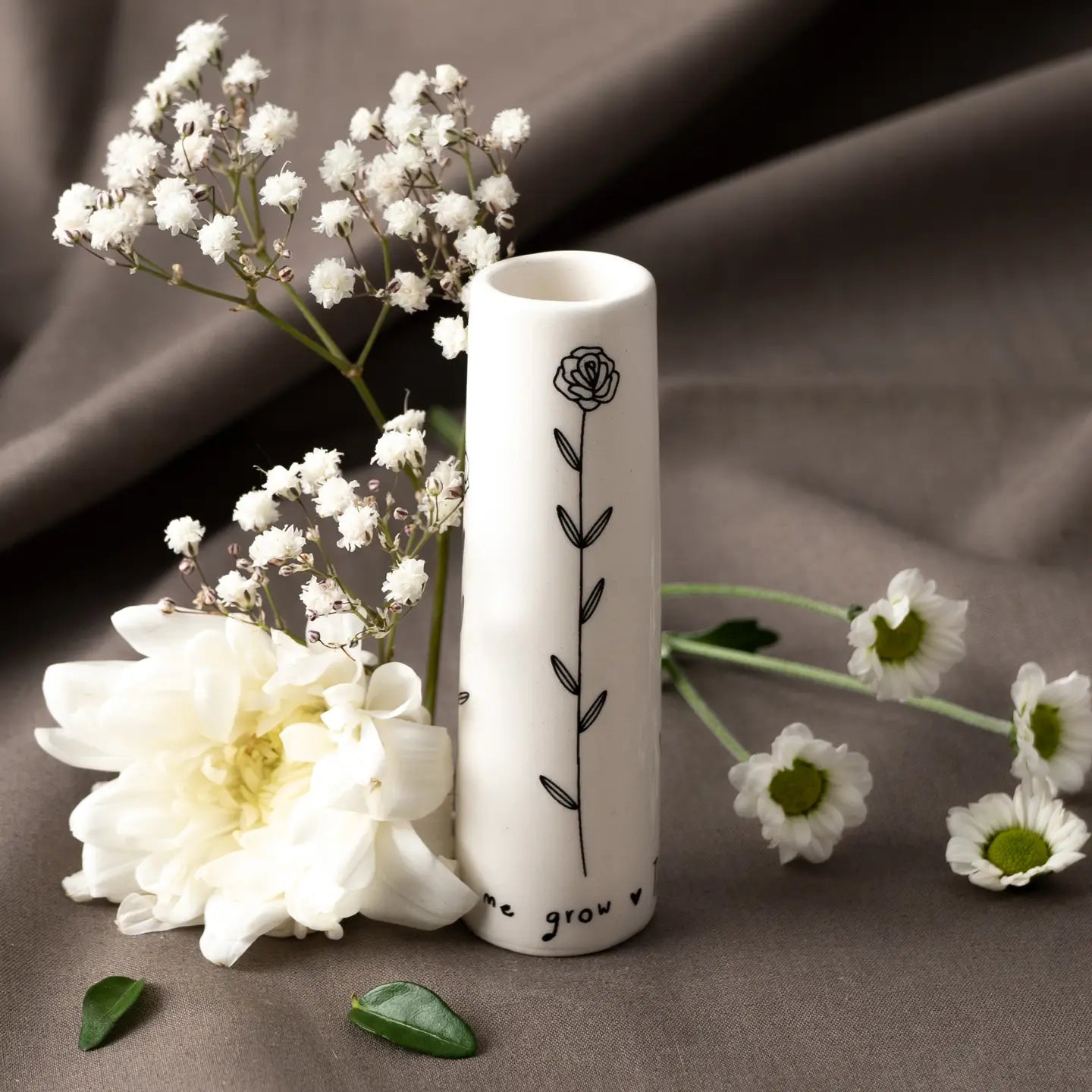 Thank You For Helping Bud Vase with flowers on display.