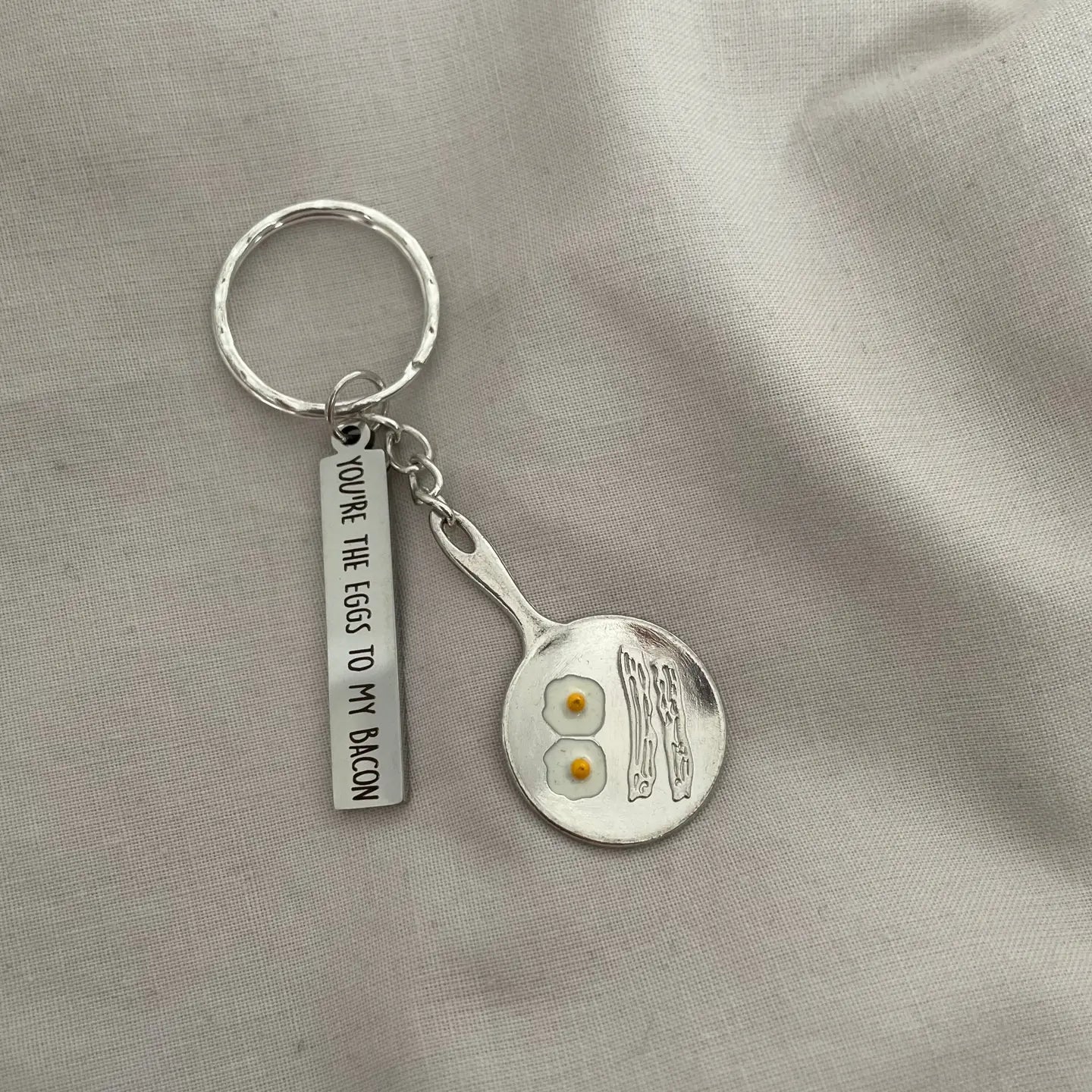 You're the eggs to my bacon keyring with frying pan charm.