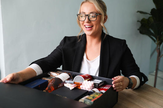 A thoughtfully presented corporate gift with a personalised thank you card celebrating employee appreciation in the workplace