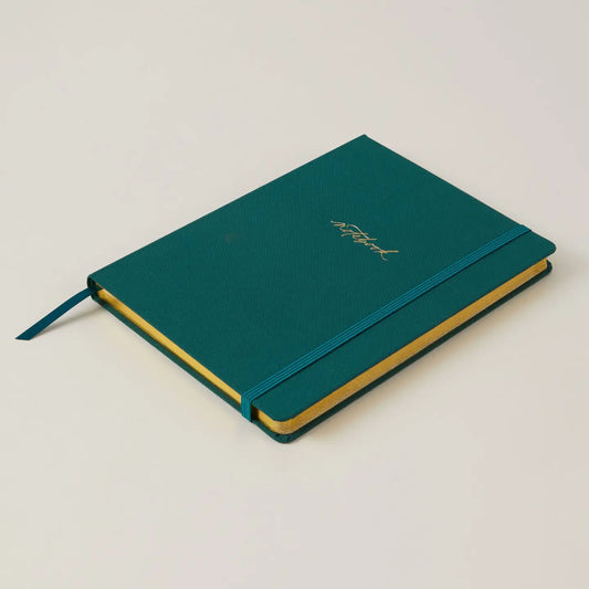 Luxury notebook in juniper green with premium hardback finish.
