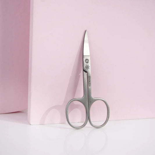 Brushworks Nail Scissors against pink background