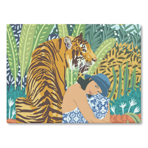 Rectangular glass chopping board featuring vibrant tiger artwork by Uma Prabhakar Gokhale.