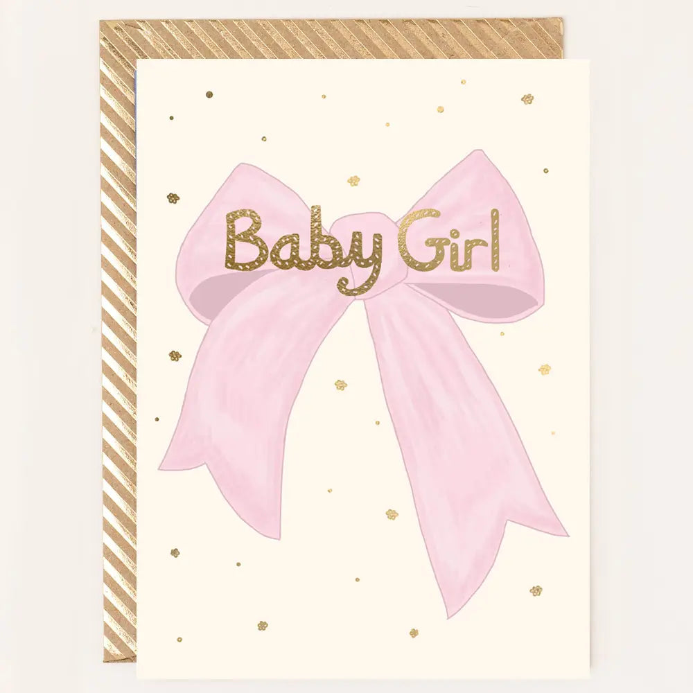Baby girl bow greetings card with pink bow and patterned envelope.
