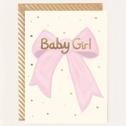 Baby girl bow greetings card with pink bow and patterned envelope.