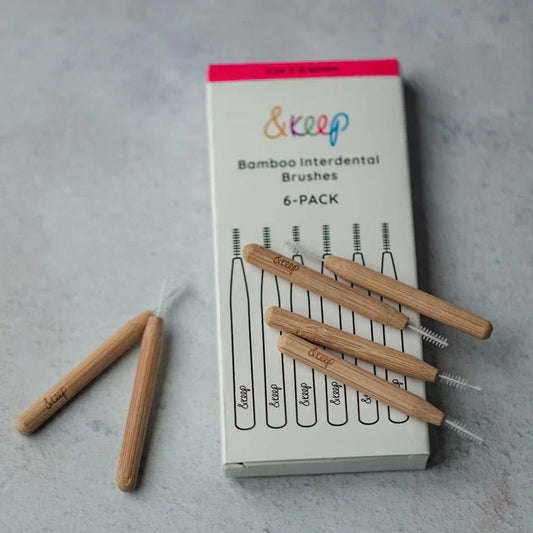 Bamboo interdental brushes pack, eco-friendly design, 6 brushes for effective teeth cleaning.
