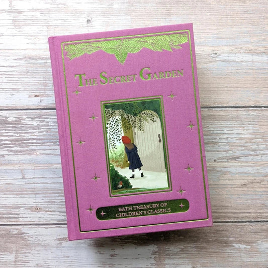 Beautifully illustrated "The Secret Garden" children's book with ornate cover design.