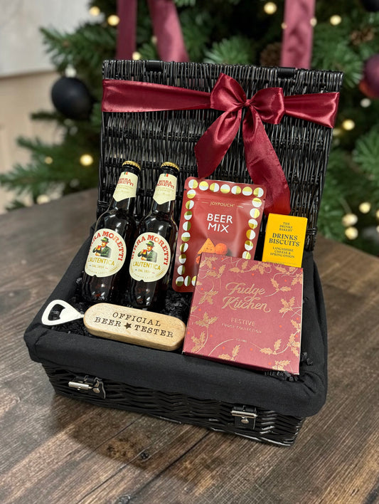 Beer and Festive Treats Hamper with a choice of Theakston or Birra Moretti, a beer tester bottle opener, snacks and festive fudge. A fun Christmas gift.