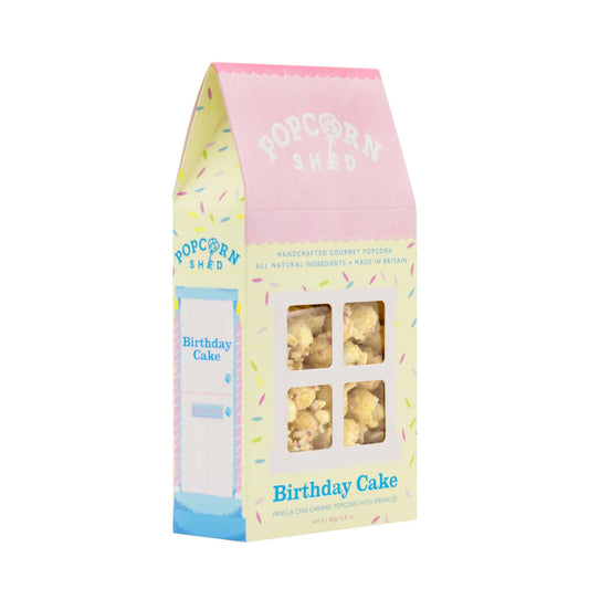 Birthday Cake Popcorn Shed packaging with vanilla caramel popcorn inside.