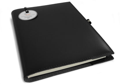 Acuto refillable leather journal handmade in Florence from top-grain Spazzolato leather, featuring a luminous finish and sophisticated modern design.