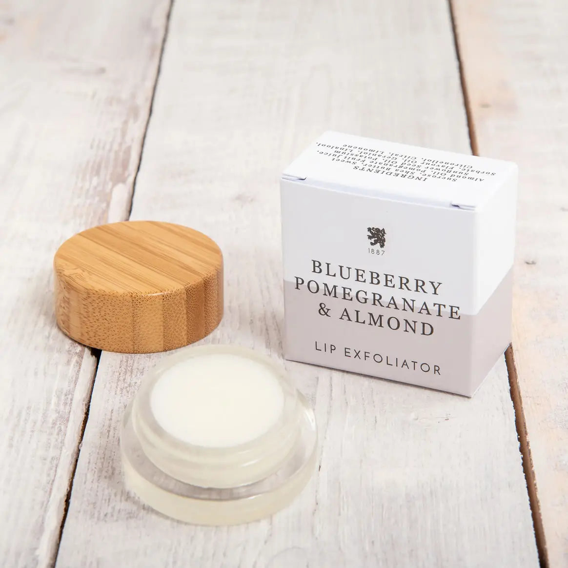 Blueberry, Pomegranate and Almond lip exfoliator with sugar crystals and almond oil.