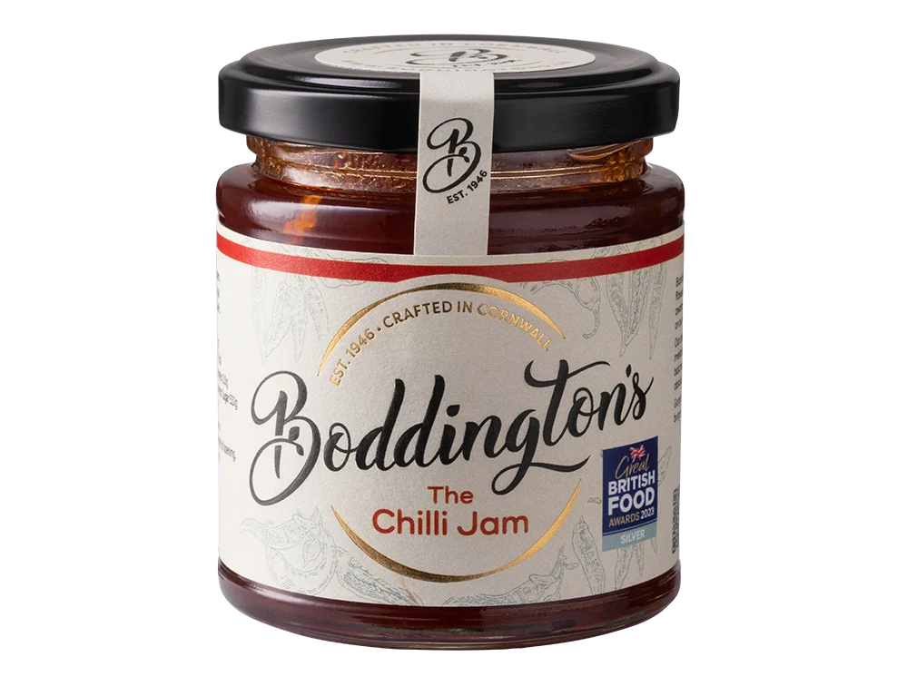 Jar of Boddingtons Chilli Jam showcasing its vibrant red colour and rustic handmade label.