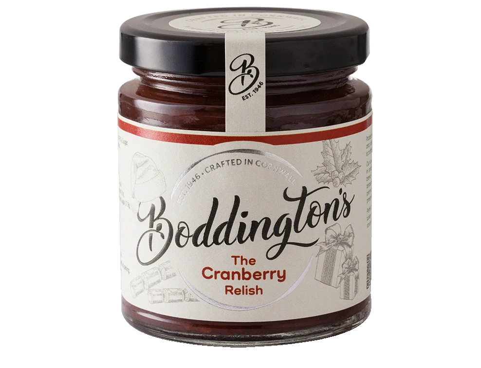 Jar of handmade cranberry relish from Cornwall with cranberries, orange and raisins.