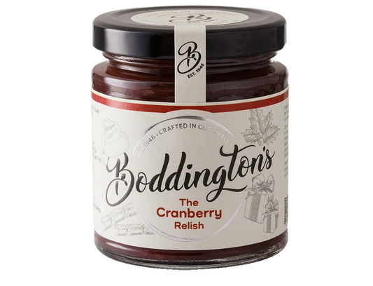 Jar of handmade cranberry relish from Cornwall with cranberries, orange and raisins.