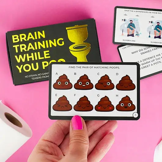 Brain Training While You Poo Cards game set on pink background.